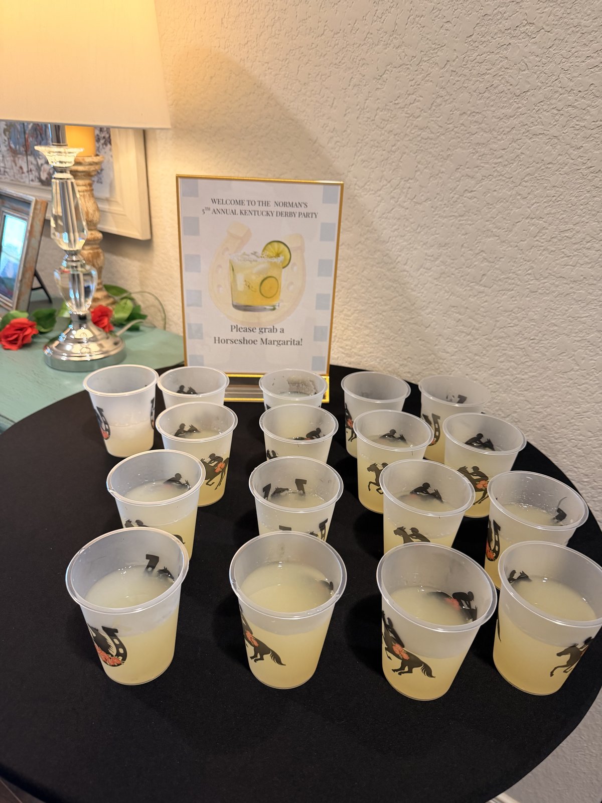 Frosted logo cups lined up at a Sip N Social event